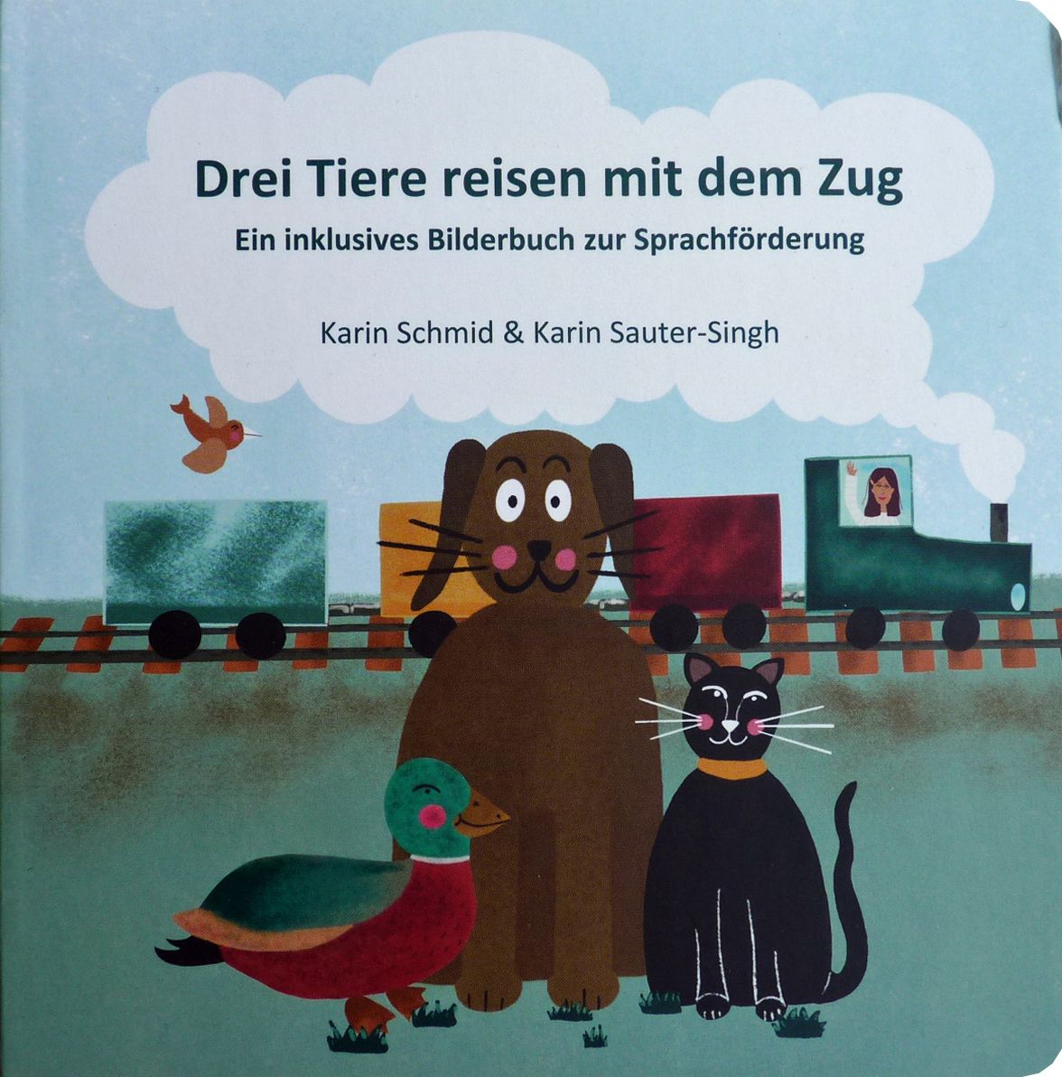 Drei Tiere reisen mit dem Zug